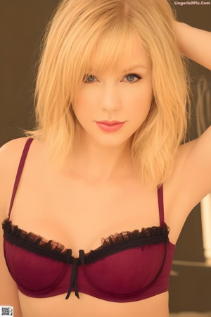 A blonde woman is sitting on a bed with her hands on her hips.