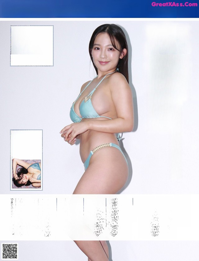 A woman in a blue bikini posing for a magazine.